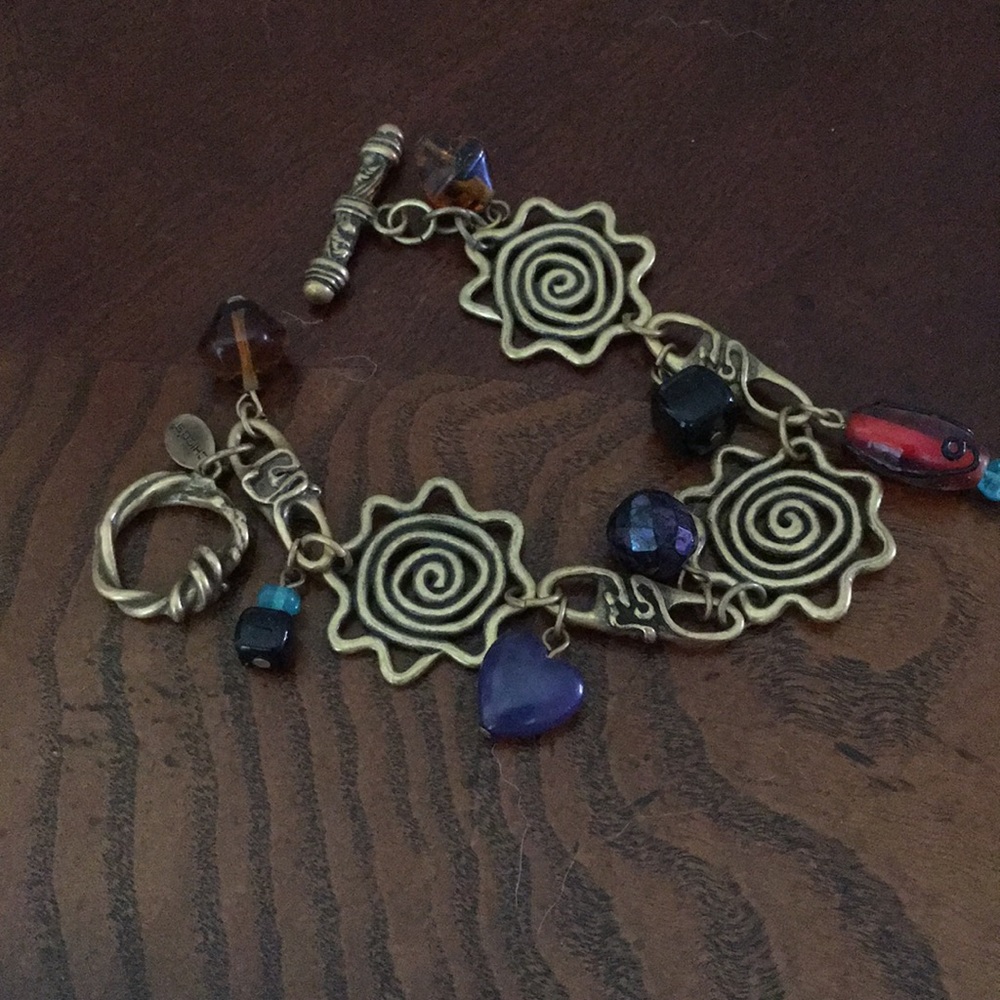 Chico’s cute whimsical brass and red bead bracelet